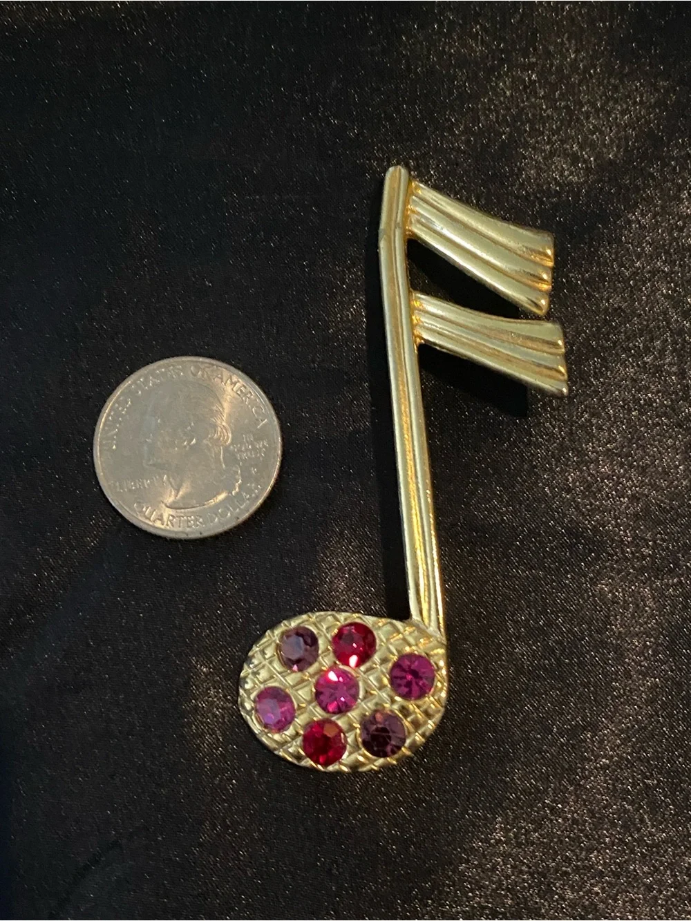 Gold-Tone Musical Note Brooch with Pink & Red Stones